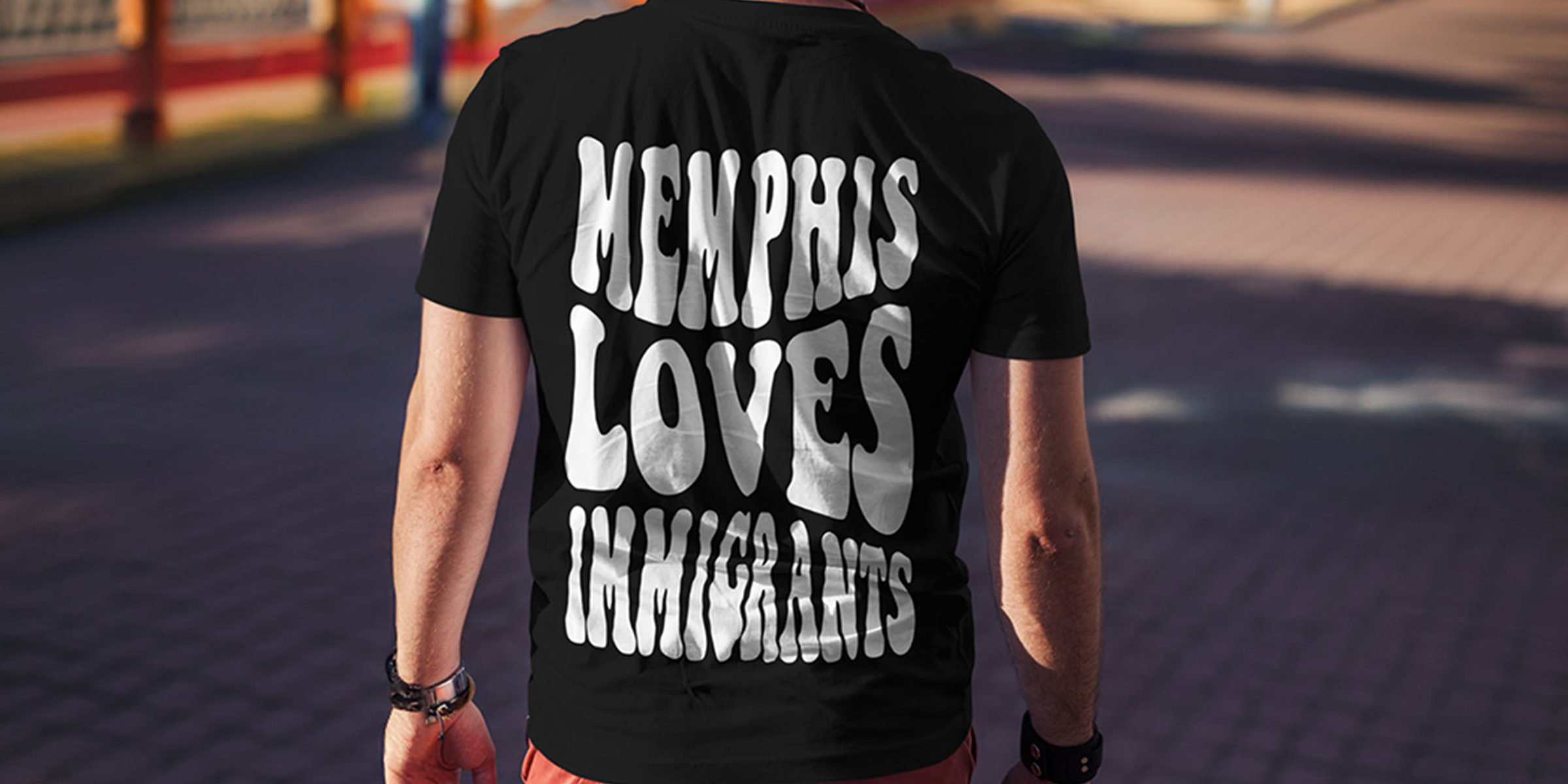 Flat lay of World Relief Memphis apparel and sticker system